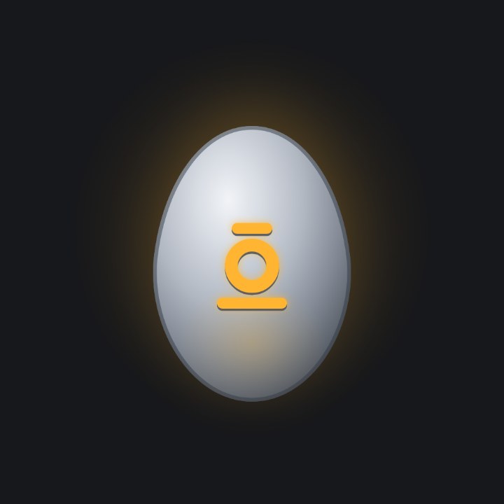 A palladium egg with a disc between two dies inlaid.