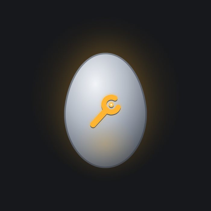 A palladium egg with an open-end wrench inlaid in amber.